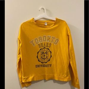 Yellow Toronto shirt.